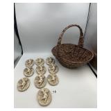 WICKER BASKET, CHERUB RELIEF WALL PLAQUES.