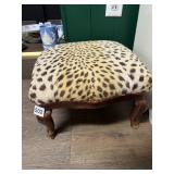 LEOPARD PRINT UPHOLSTERED OTTOMAN, TURNED WOODEN