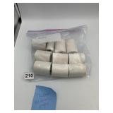 THERMAL MACHINE PAPER ROLLS, BAG OF.