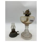 VINTAGE GLASS OIL LAMPS, AMBER FONT, METAL BASE.