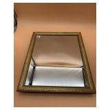 FRAMED WALL MIRROR, ORNATE GOLD-TONE FRAME.