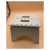 FOLDING PLASTIC STEP STOOL, GRAY.
