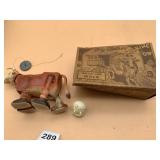 WIZ WALKER CELLULOID MILKING COW TOY, SWISS-MADE,