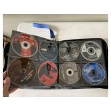 ASSORTED DVD MOVIES, TV SHOWS, AND GAMES IN BLACK