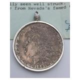 1881-O MORGAN SILVER DOLLAR IN BEZEL