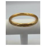 GOLD-TONE HINGED BANGLE BRACELET, FLORAL ENGRAVED