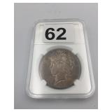 1923 PEACE DOLLAR, SLABBED, SILVER COIN.