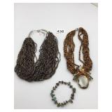 JEWELRY LOT: MULTI-STRAND BEADED NECKLACE, TIGER