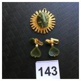 BSK GOLD-TONE SUNBURST PENDANT W/ GREEN STONE,