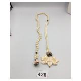 VTG CARVED BONE OR RESIN FLOWER PENDANT NECKLACE