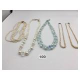 MULTI STRAND PEARL NECKLACE WITH FACETED BEADS
