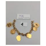 14K YELLOW GOLD CHARM BRACELET W/ MULTIPLE 33.59G