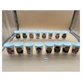 ASSORTED PLASTIC FOOTBALL PLAYER CUPS.