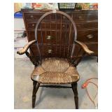 WINDSOR STYLE ARMCHAIR, DARK WOOD, RUSH SEAT.