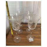 CLEAR GLASS GOBLETS W/ ETCHED FLORAL PATTERN.