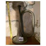 PATINATED METAL BUGLE, MUSICAL INSTRUMENT.
