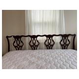 ORNATE PIERCED WOOD HEADBOARD, DARK FINISH.,