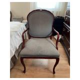 CARVED WOOD ARMCHAIR, UPHOLSTERED SEAT AND BACK.