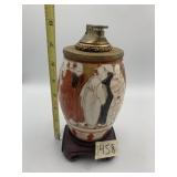 CERAMIC TABLE LIGHTER, HAND-PAINTED FIGURES,