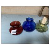 ASSORTED COLORED GLASS VASES W/ RUFFLED RIMS.