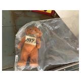 ORANGE WIND-UP TEDDY BEAR TOY, SEALED IN BAG.