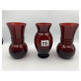 RED GLASS VASES, ASSORTED SHAPES.
