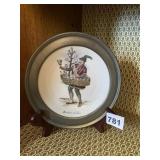 PEWTER AND PORCELAIN WALL PLATE, MARCHAND DE