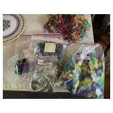 MARDI GRAS BEADS, FEATHER BOAS, AND SEQUIN TRIM
