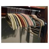 ASSORTED VELVET-FLOCKED CLOTHES HANGERS,