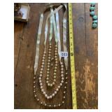 ASSORTED BEADED NECKLACES ON RIBBON STRANDS,