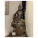 BRONZE-TONE GUANYIN FIGURINE, SEATED ON ROCKY