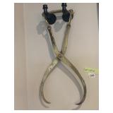 VINTAGE BRASS ICE TONGS, WALL-MOUNTED DISPLAY,