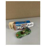 MUKY DIE-CAST RACING CAR, GREEN W/ CHAMPION
