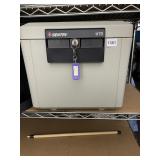 SENTRY SAFE MODEL 1170, FIRE-RESISTANT CHEST, KEY