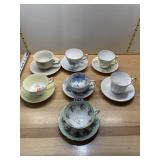 ASSORTED PORCELAIN TEA CUPS AND SAUCERS (6).