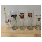 ASSORTED BREWERY GLASSES (5) FEATURING CARNIVAL