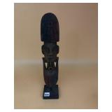 HAND-CARVED WOOD FIGURINE, TRIBAL STYLE, ON BLACK