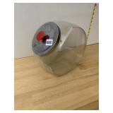VTG GLASS CANISTER W/ METAL LID AND RED KNOB.