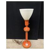 VTG ORANGE METAL TABLE LAMP W/ MILK GLASS SHADE.
