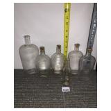 CLEAR GLASS FLASKS AND BOTTLES, EMBOSSED