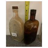 VINTAGE GLASS BOTTLES, CLEAR AND AMBER, EMBOSSED