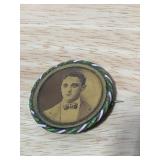 PORTRAIT BROOCH, METAL FRAME, ENAMELED TWISTED