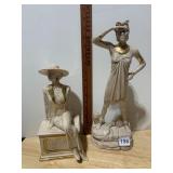 CERAMIC FEMALE FIGURINES, ONE SEATED ON PLINTH,
