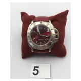 QUARTZ WRISTWATCH, RED DIAL, SILVER-TONE CASE,