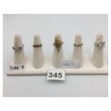 ASSORTED COSTUME RINGS, INCLUDES SILVER-TONE LEAF