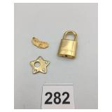 CHRISTIAN DIOR PADLOCK, GOLD-TONE METAL, ENGRAVED