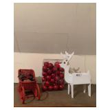 WROUGHT IRON REINDEER PLANTER, RED WICKER SLEIGH,