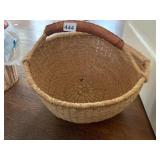 WOVEN STRAW BASKET, ROUND FORM, LEATHER WRAPPED
