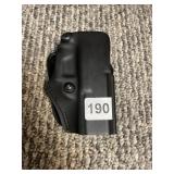 SAFARILAND MOLDED POLYMER HOLSTER, BELT LOOP