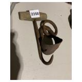 T-HANDLE HAY HOOK, METAL RING, RUSTED FINISH.